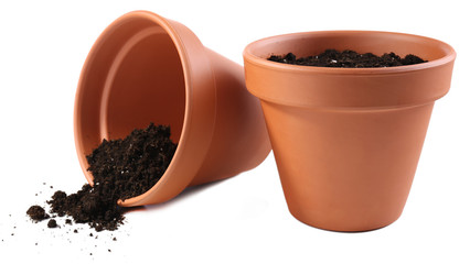 Clay flower pots and soil, isolated on white