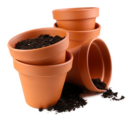 Clay flower pots and soil, isolated on white