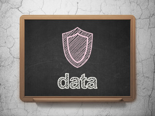 Information concept: Shield and Data on chalkboard background