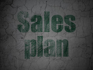 Advertising concept: Sales Plan on grunge wall background