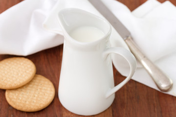 milk in jug and cookies