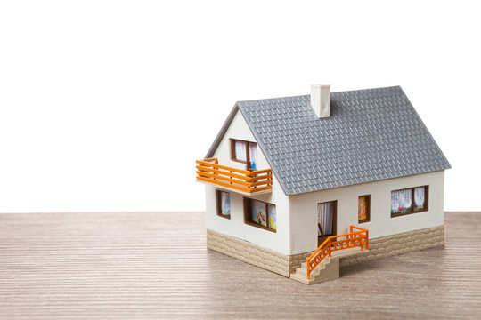 classic house model on wooden background