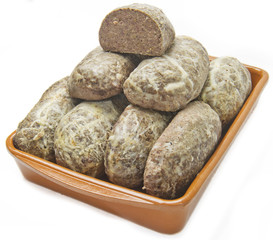 liverwurst in plate on white background