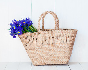 Fototapeta na wymiar wicker basket with spring flowers