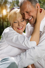 Senior couple in spring outdoors