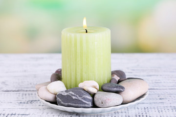 Composition with spa stones, candle