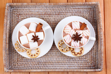 Cups of hot chocolate with marshmallows