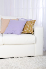 White leather sofa in room