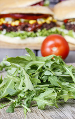 Rocket salad on wooden table