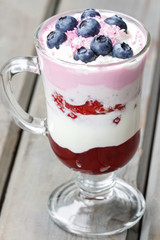 Yogurt dessert with summer fruits: strawberries, raspberries