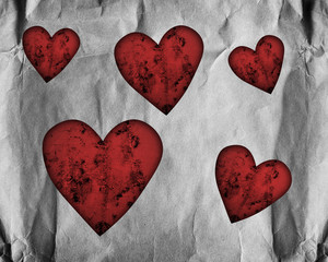 red hearts on paper
