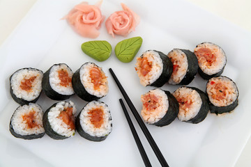 sushi set on white plate. Traditional japanese sushi rolls