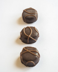 Tasty chocolate bonbon isolated on a white background