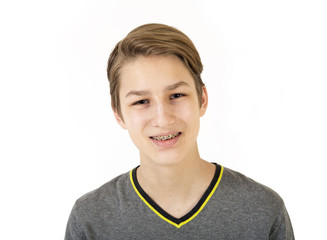 Smiling teen with orthodontic braces