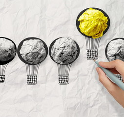 hand drawn air balloons with crumpled paper ball as leadership c