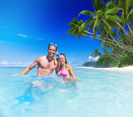 Couple with Scuba Gear in Paradise