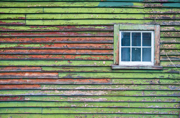 Fototapeta na wymiar Color-Peel wood texture with old window