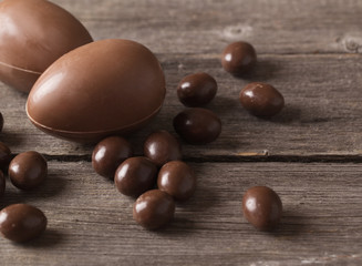 Chocolate Easter Eggs Over Wooden Background