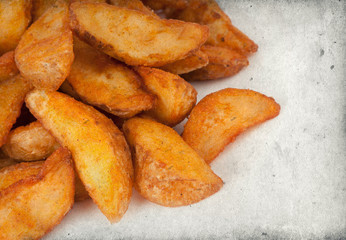 Fried potato wedges
