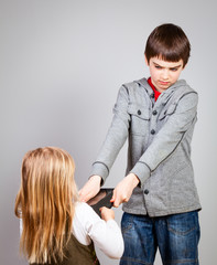Children fight for tablet computer