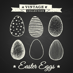 Hand-drawn easter eggs - collection of eggs on chalkboard backgr