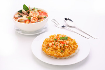 Tom Yum Soup, fried omelet topped on rice