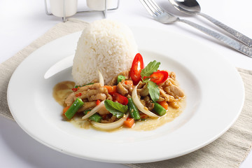 Thai spicy food, chicken whit basil on rice.