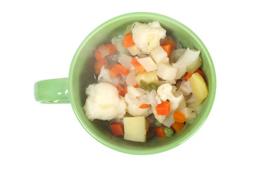 Vegetable soup in ceramic cup