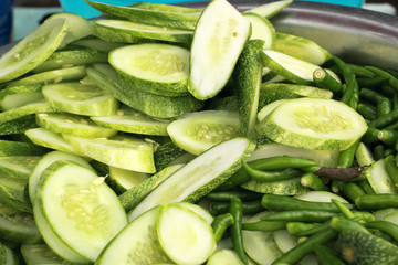 mix of fresh vegetables cucumber and chili.