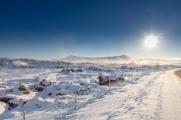 Winter drive through volcanic landscape