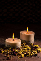 Dry flowers petals and candles