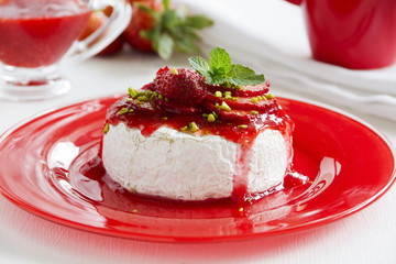 Baked Camembert with strawberry sauce strawberries.