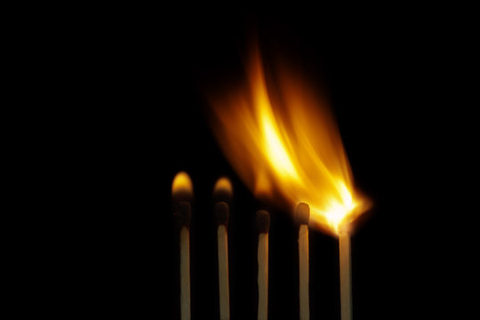 Burning wooden matchsticks