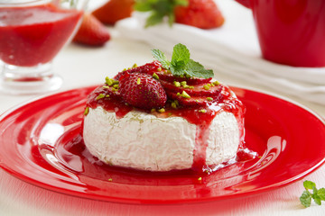 Baked Camembert with strawberry sauce strawberries.