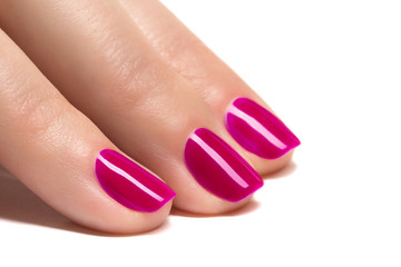 Woman hands with manicured red nails closeup