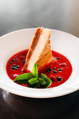 cheesecake with berry sauce