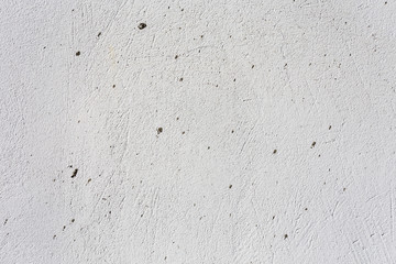 Broken concrete wall with cracks