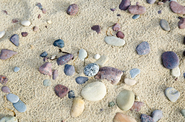Fototapeta na wymiar Untouched sandy beach with pebbles
