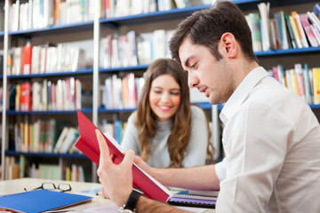 People studying in a library