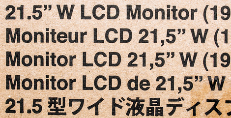 Standard monitor cardboard box with notes in diverse languages