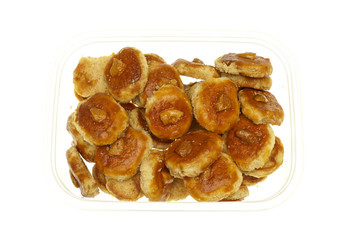 Cookie and cashew nut in box isolated