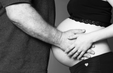 Man Woman Partners Expecting Baby Both Touch Hands Pregnant