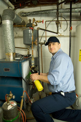 Plumber repairs furnace 
