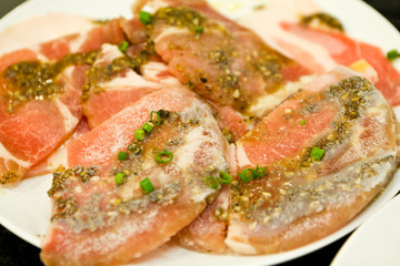 Fresh raw pork sliced in plate