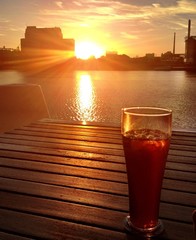 sunset with a cold cocktail