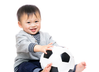 Asian baby boy with soccer ball