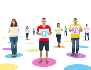 Fototapeta premium Connected Multi-Ethnic People Holding a Symbol