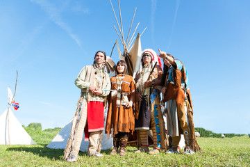 Group of North American Indians about a wigwam © Shchipkova Elena