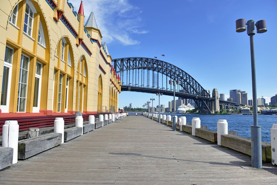 Boardwalk by Harbour with Bridge, Sydney Australia