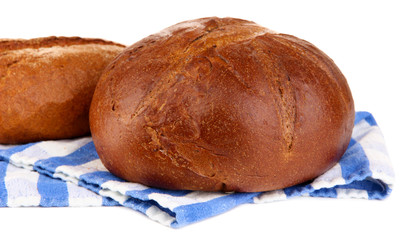 Rye breads on napkin isolated on white